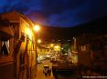 Buti (PI) - La foto  scattata ai piedi della torre di Castel Tonini con lo sguardo rivolto verso piazza garibaldi. Alla destra scorrono le acque del Rio Magno, che poi scompaiono sotto la piazza. La sera la bellezza del posto e la particolare illuminazione regalano una piacevole sensazione.