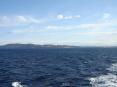 Canale di Piombino (LI) - La costa della citt e le sue colline dal mare del canale. Al centro il promontorio del Falcone