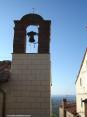 Castagneto Carducci (LI) - Un particolare campanile di colore chiaro si staglia sul celeste del cielo toscano