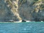 Gita in barca a Baratti, Piombino (LI) - La prima piccola spiaggia a sud di Punta delle Pianacce  riconoscibile da un grande masso che emerge dal mare - Fotografia 8 luglio 2012, Toscana