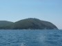 Gita in barca a Baratti, Piombino (LI) - Il promontorio di Populonia e la costa che va dal porto turistico a Punta Saltacavallo, sulla destra - Fotografia 8 luglio 2012, Toscana