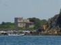 Gita in barca a Baratti, Piombino (LI) - Ingresso del porto canale dello Stellino e della costruzione fortificata Torre Nuova. La torre fu costruita nel 1670 per volont della famiglia dei Medici in posizione strategica al confine fra il Granducato di Toscana e il Principato di Piombino - Fotografia 8 luglio 2012, Toscana