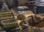 Mercato Centrale Firenze - Due panini al lampredotto con salsa verde attendono solo di essere chiusi col cappello inzuppato nel brodo di cottura come vuole la antica ricetta tradizionale fiorentina - Fotografia Toscana febbraio 2015