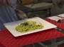 Mercato Centrale Firenze - Manca solo una spolverata di formaggio grattugiato ed il capolavoro  pronto per essere gustato: linguine al pesto genovese - Fotografia Toscana febbraio 2015