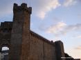 Montalcino (SI) -  Due torri e le possenti mura fortificate della Fortezza di Montalcino. Sulla sinistra si nota l