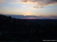 Montalcino (SI) - Tramonto sulla campagna ripreso da porta Cassero, subito sotto alle mura della antica Fortezza