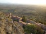 Montemassi, Roccastrada (GR) - Dalla sommit rocciosa della collina sulla quale sorge il castello la vista del paese si perde sullo sfondo degli uliveti e dei campi coltivati della maremma grossetana - Fotografia 8 dicembre 2011, Toscana