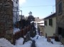 Montieri (GR) - Vicolo del paese che serpeggia fra antiche abitazioni coperte di neve - Fotografia Marzo 2010