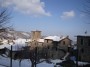 Montieri (GR) - Vista da via Verdi dei tetti del paese con la neve e del campanile innevato - Fotografia Marzo 2010