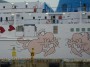 Navi e traghetti in Toscana - Fiancata con i disegni di Mordillo della M/N Moby Love a Portoferraio - Fotografia maggio 2013