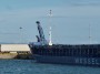 Navi e traghetti in Toscana - Particolare di prua della nave cargo Vessels Theseus IMO 9390159 a Piombino con il sistema avanzato di vele SkySails per il risparmio dei consumi di carburante - Fotografia ottobre 2013
