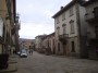 Santa Fiora (GR) - Piazza Garibaldi. Sulla sinistra il Palazzo Comunale di Santa Fiora e il Palazzo Cesarini Sforza. La piazza  pavimentata da un antico lastricato in pietra. Sulla estrema sinistra si nota un vecchio carrello usato nelle miniere della zona - Fotografia febbraio 2010
