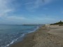 Spiaggia di Carbonifera, Piombino (LI) - Lato nord della spiaggia con lo sguardo verso il pontile che la delimita. L