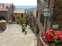 Tatti, Massa Marittima (GR) - Vista di piazza della Cisterna, nel cuore del centro storico dell