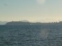 Torre del Sale e Foce del Cornia, Piombino (LI) - Vista dalla foce verso il mare del porto di Piombino con lo sfondo della sagoma dell