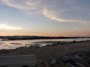 Torre del Sale e Foce del Cornia, Piombino (LI) - La foce del fiume che ha dato origine alla Val di Cornia in una ripresa al tramonto. Oltre la foce si riconosce la spiaggia sabbiosa del Quagliodromo - Fotografia ottobre 2012