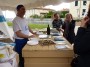 Tutti pazzi per la palamita 2012 - Stand del ristorante Blue Marlin con assaggio di saccottino di melanzane in mousse di azzurro e noci - San Vincenzo (LI), Fotografia 6 maggio 2012, Toscana