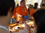 Tutti pazzi per la palamita 2013 - Preparazione di piatti di polpo lesso con guarnitura di limone - San Vincenzo (LI), Fotografia 5 maggio 2013, Toscana