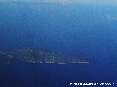 Isola del Giglio (Gr) - Foto aerea. Uno scatto da alta quota. La foto è stata scattatada una quota di circa 32000 piedi ovvero circa 10000 metri di altitudine dal livello del mare. (Luglio 2006)