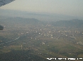 Pisa (Pi) - Foto aerea panoramica della citt con lo sfondo dei Monti Pisani e di Lucca oltre il monte Serra.