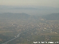 Pisa (Pi) - Foto aerea panoramica della citt. Davanti il fiume Arno col ponte dell