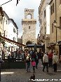 Piombino (LI) - Vista  di corso Vittorio Emanuale con lo sfondo del Torrione e del Rivellino